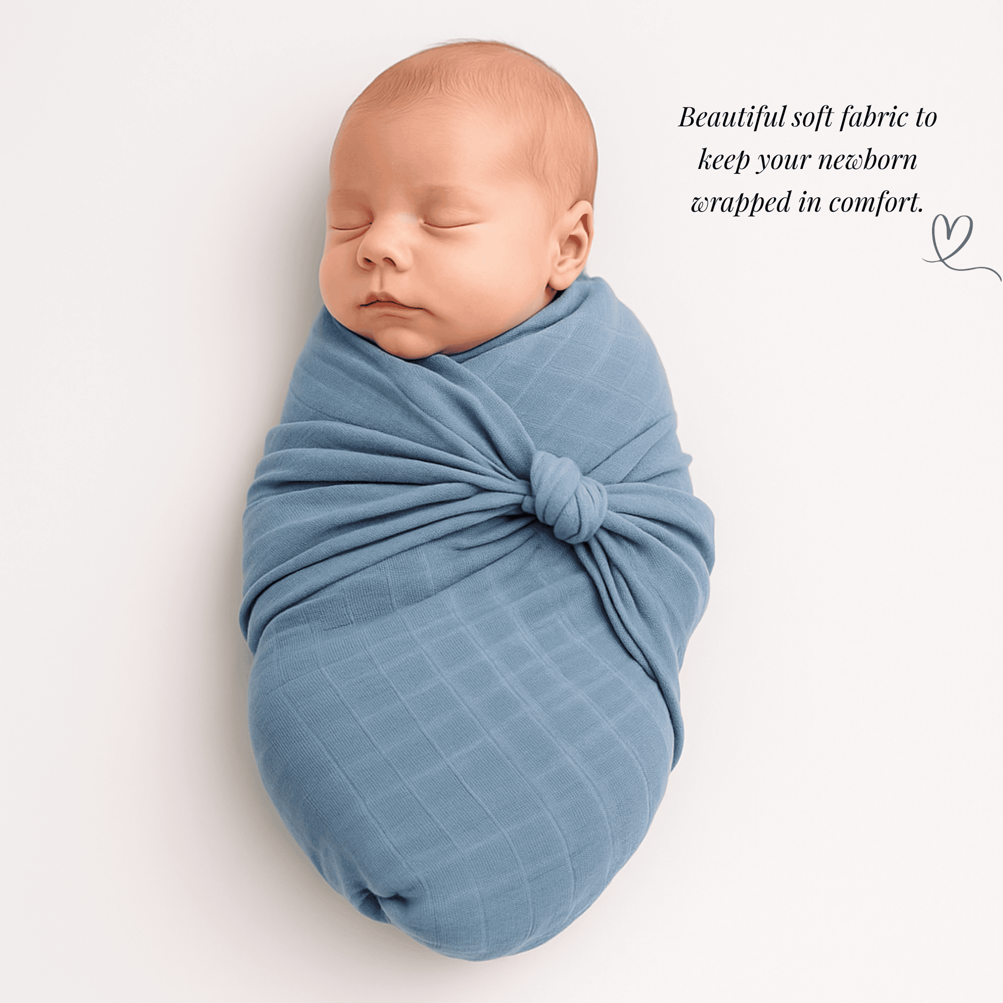 Baby wrapped in blue swaddle made from 100% organic cotton