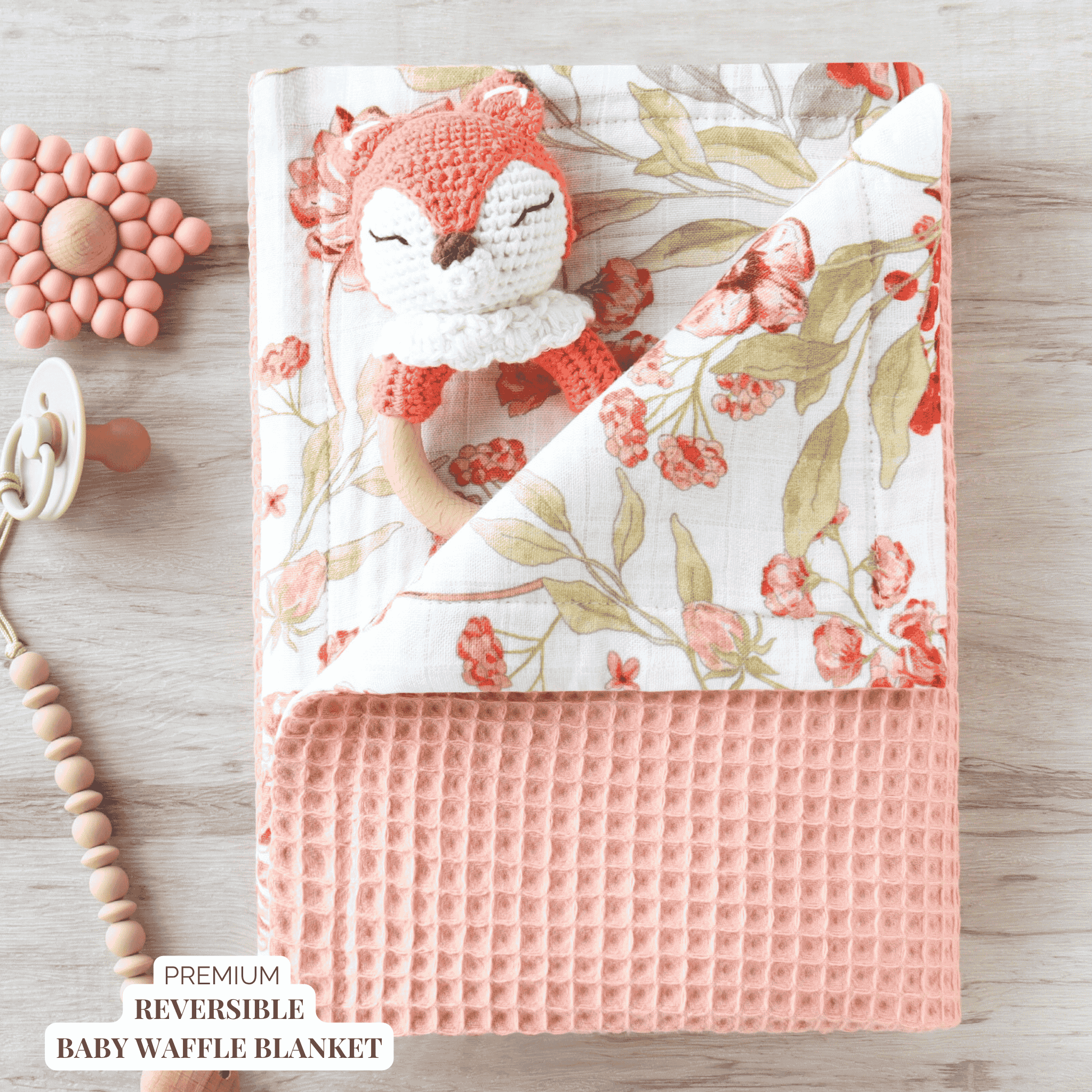 Baby waffle blanket with floral design, soft and breathable.