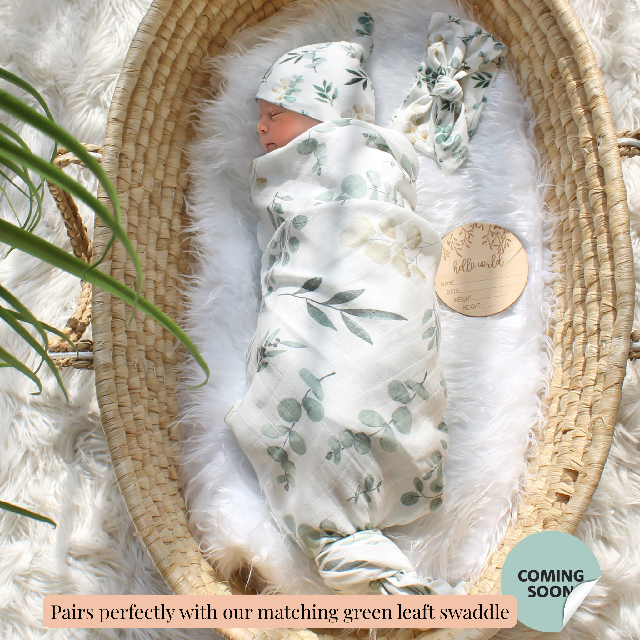 Matching Newborn baby swaddle in a floral pattern, leaf and lullaby collection