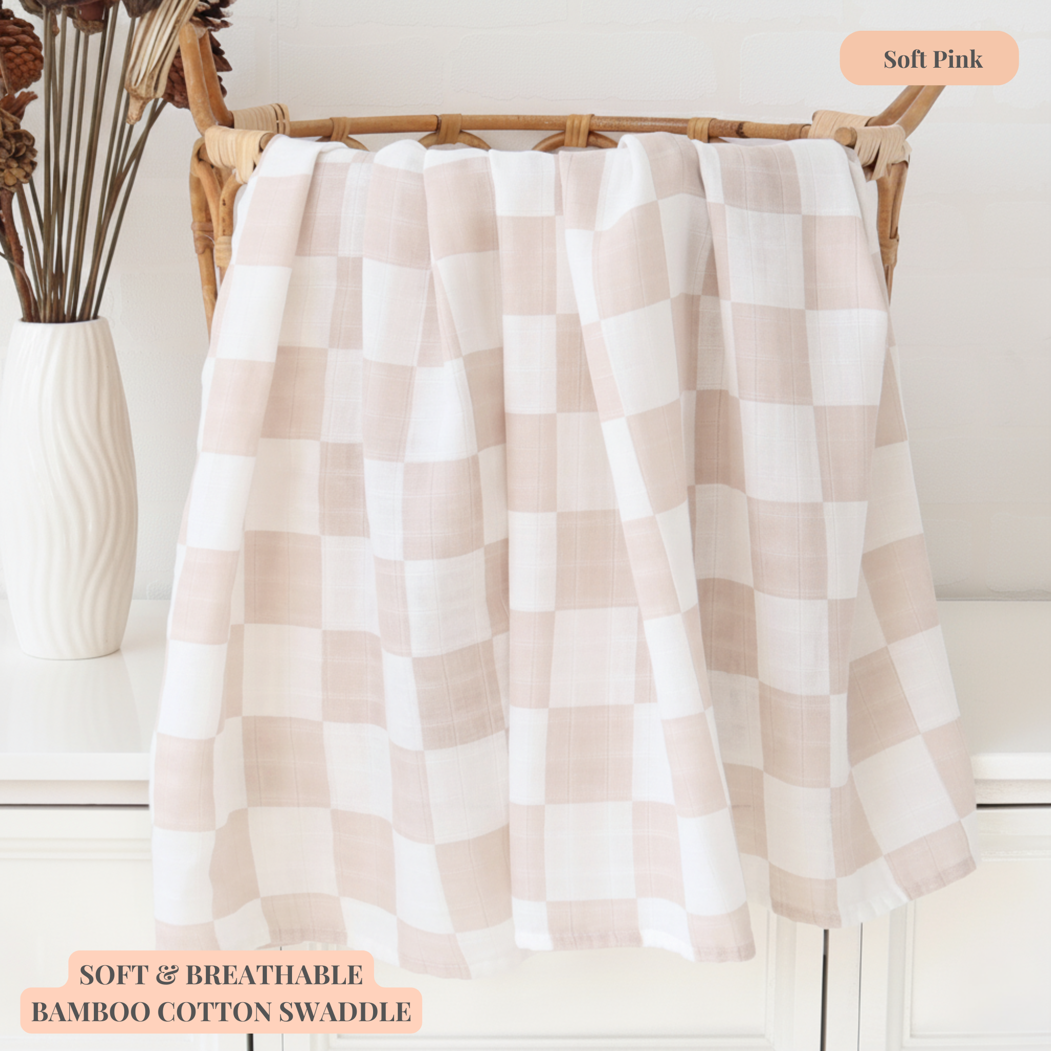 Breathable bamboo cotton baby swaddle in check print, soft pink colour