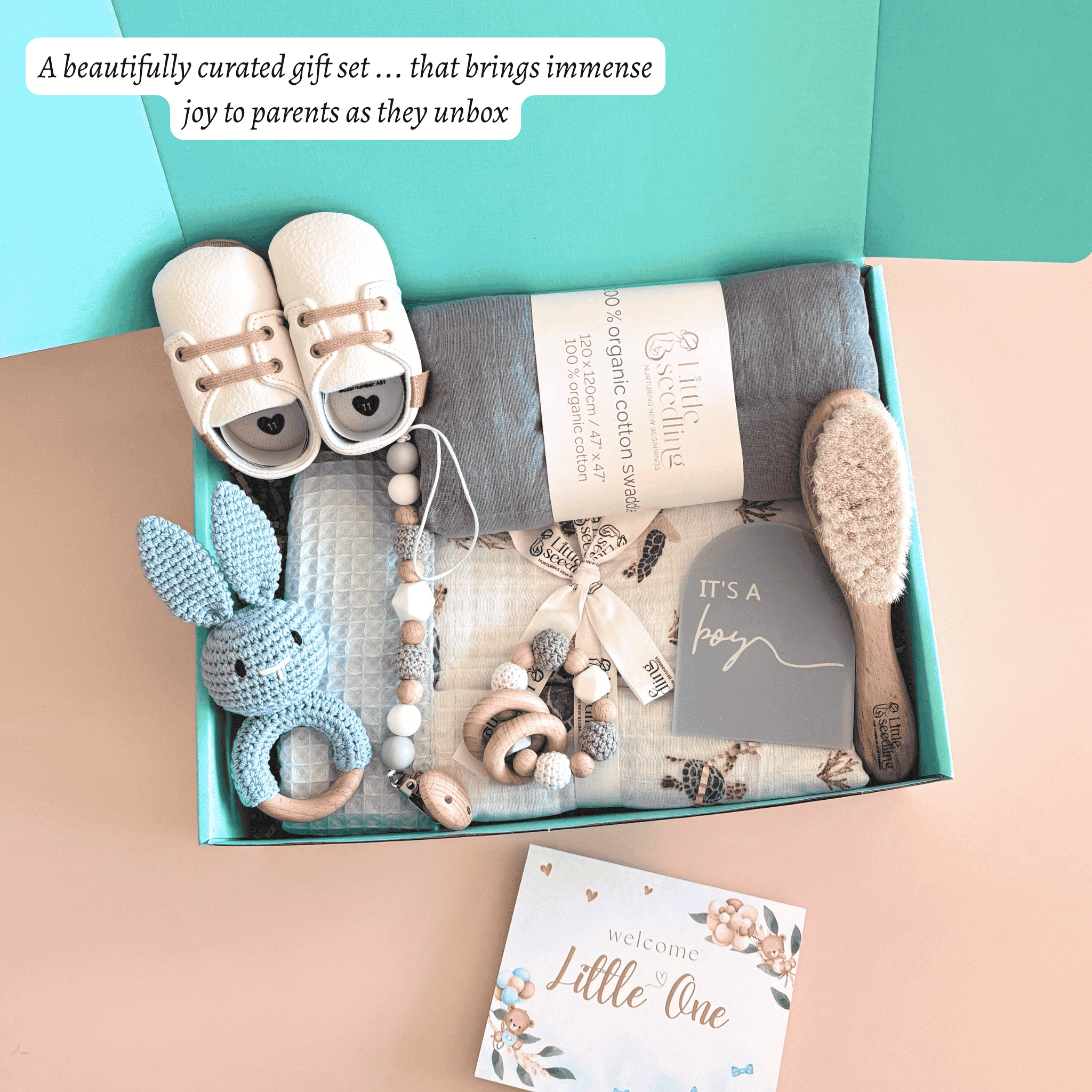 Curated Baby gift set with shoes, blanket, and toys perfect as a baby boy gift.