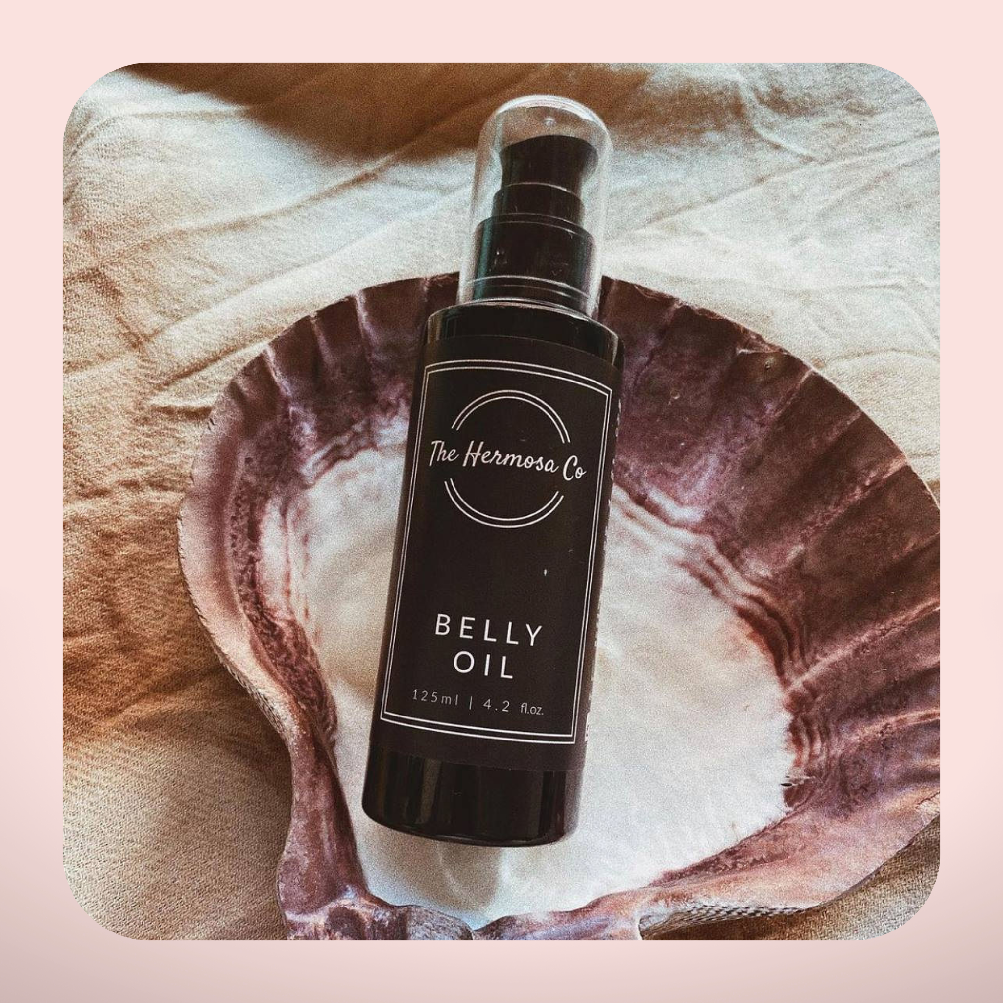 100% natural and organic belly oil by The Hermosa Co for stretch marks during pregnancy